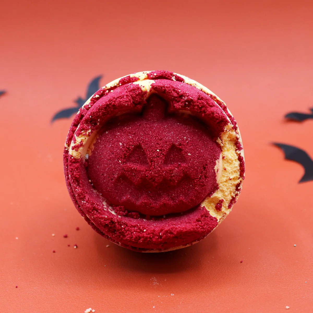 Aniseed Halloween bath bomb with orange and black colours, part of festive bath bombs collection on white background