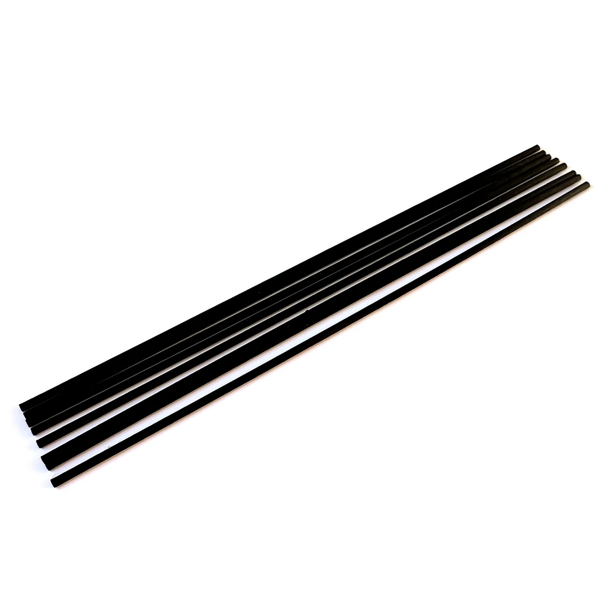 Fibre black reed diffuser with slender 25cm x 3mm reeds in a minimalist black container