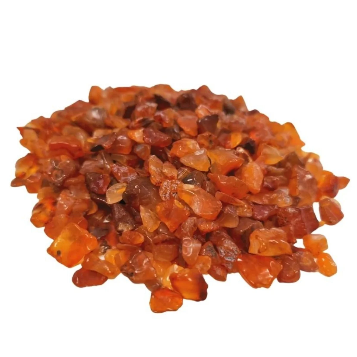 Pile of natural carnelian stones in small chip form, bulk 1KG, showing rich orange-red hues and rough textures
