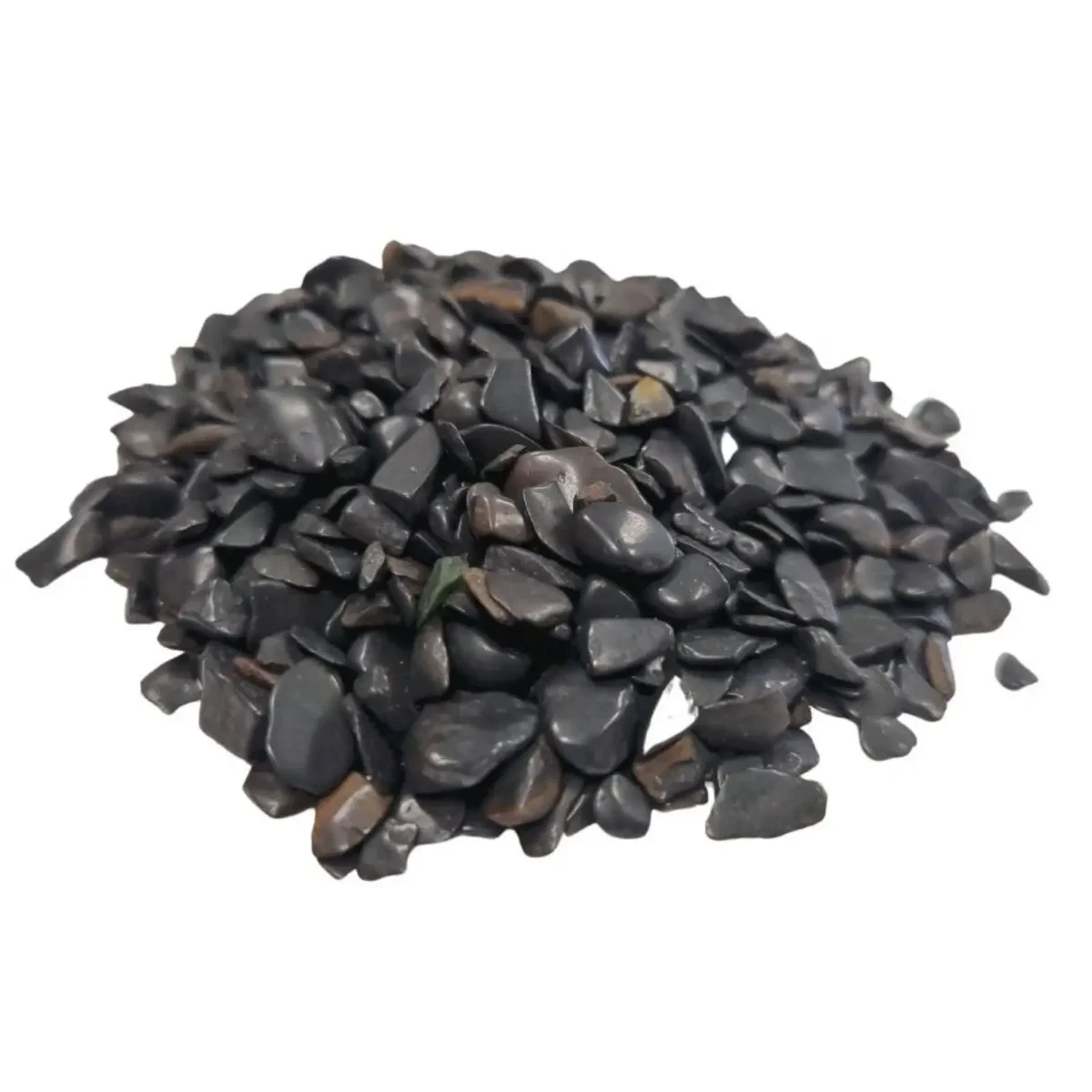 Bulk black tourmaline gemstone chips weighing 1KG in a pile, showing rough, irregular shapes and deep black color