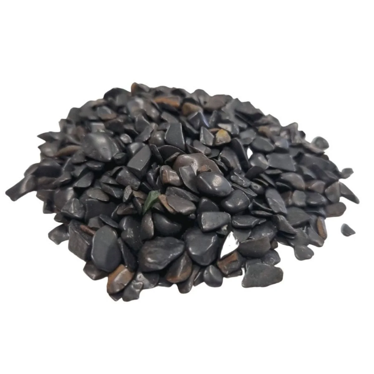 Close-up of black tourmaline stones in small chips, bulk 1KG, showing rough textured surfaces