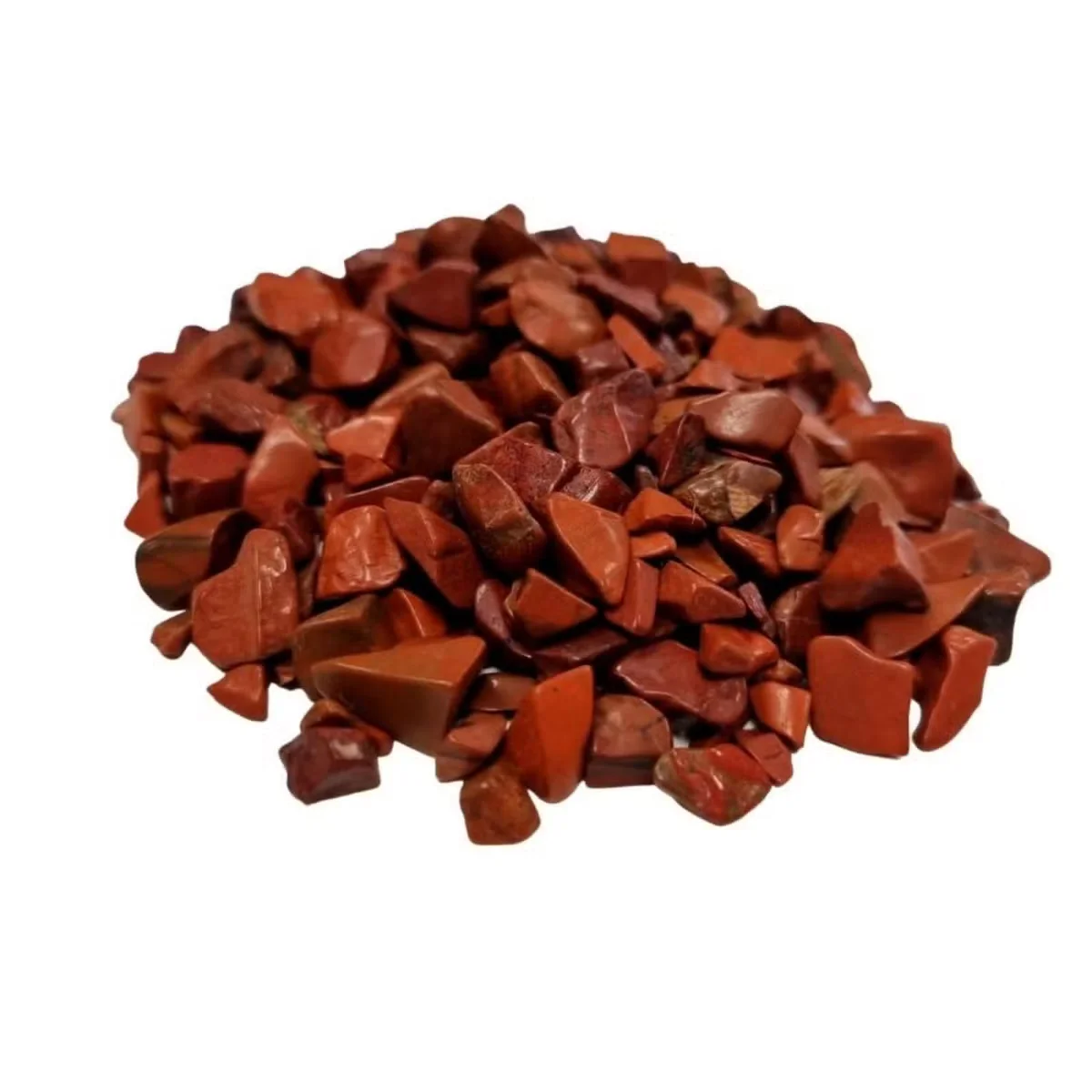 Close-up of red jasper natural gemstone chips piled in bulk weighing 1KG