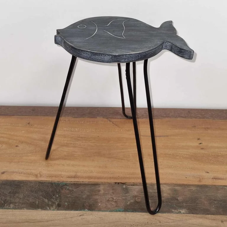 Greywashed wooden fish ornament on a stand, displayed in a resting pose.