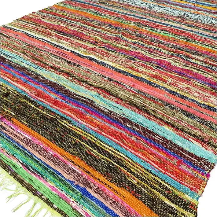 Luxury green rag rug measuring 151 by 90 cm laid flat showing texture and pattern details