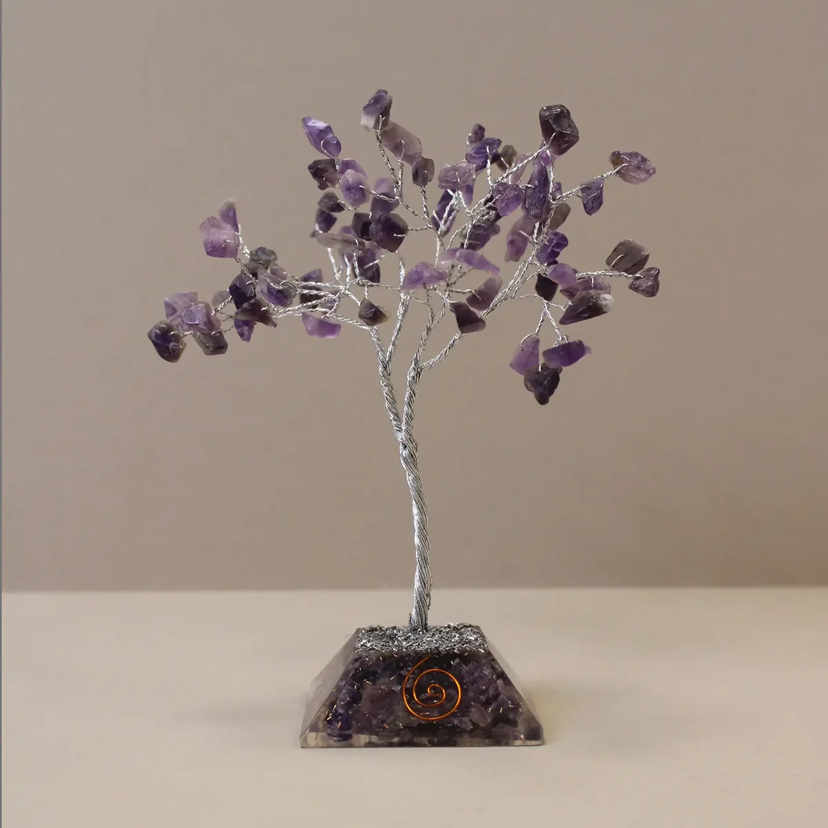 Gemstone tree ornament with 80 amethyst stones on an organite base, decorative and colorful display piece