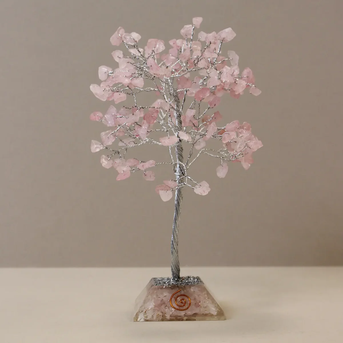 Gemstone tree ornament with rose quartz stones and organite base featuring 160 polished gemstone leaves