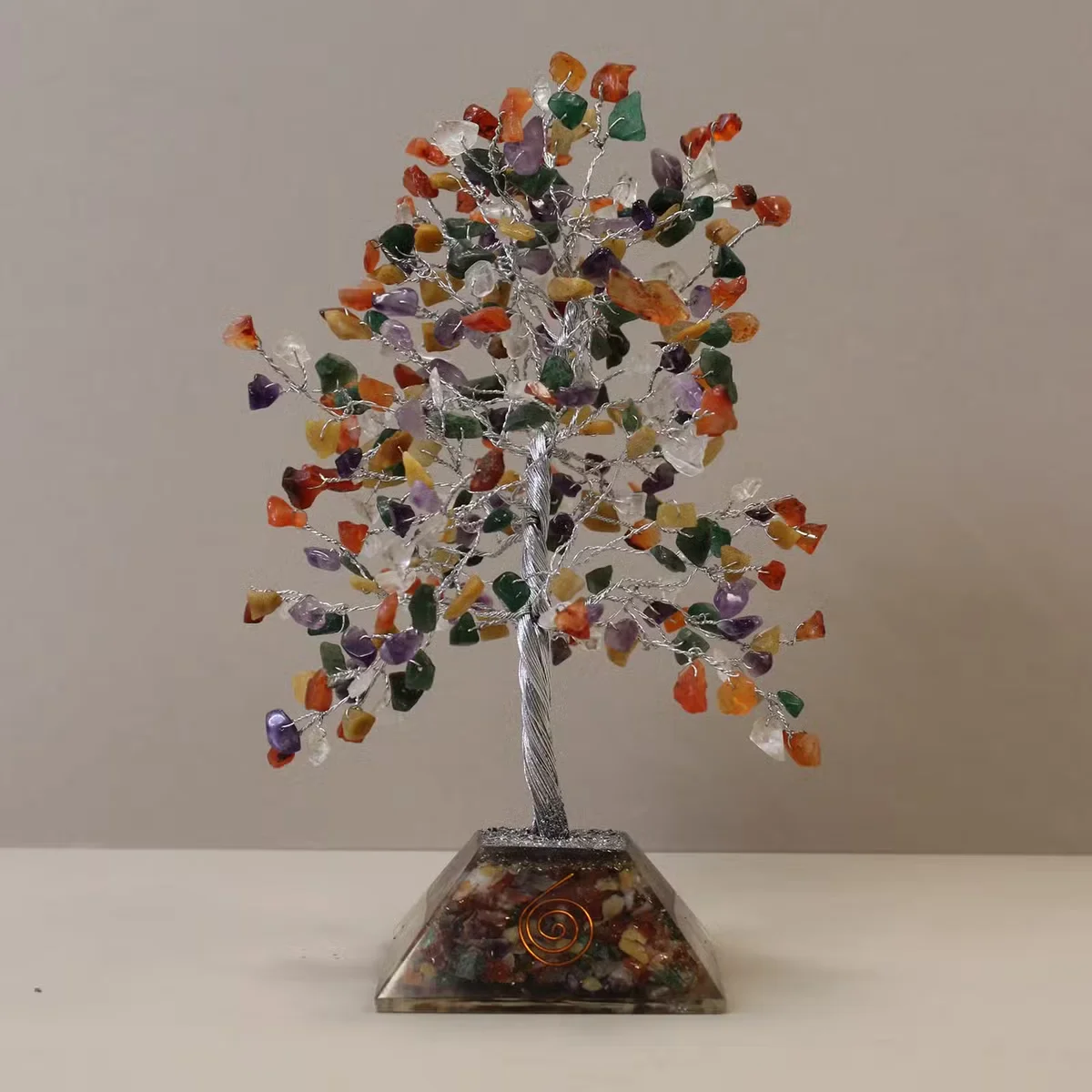 Decorative gemstone tree with multicolored stones and organite base, showcasing 320 polished gemstones in a vibrant display
