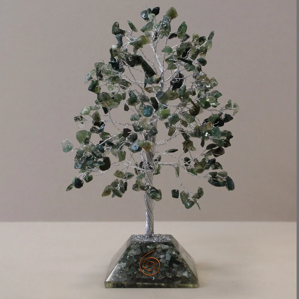 Gemstone tree ornament with moss agate stones and organite base displaying 320 polished gemstone pieces