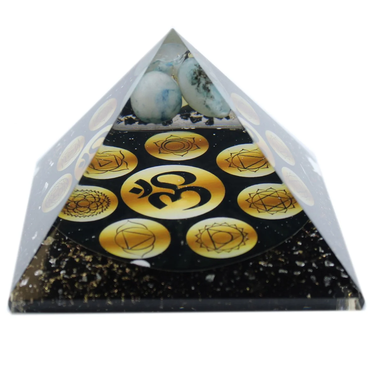 Orgonite pyramid 90mm with Midnight Om Chakra design in deep blue and purple tones on a white background