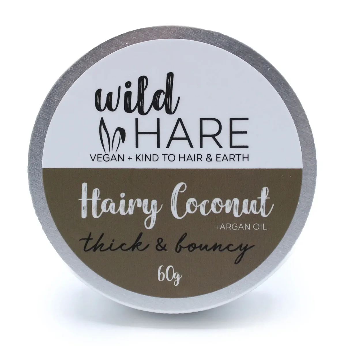 Wild Hare solid hairy coconut shampoo bar 60g with textured surface on white background