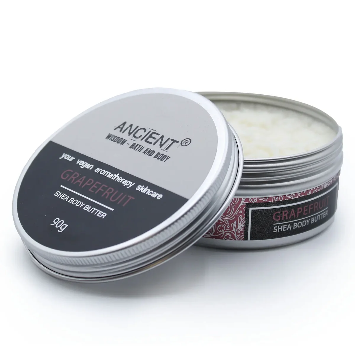 90g jar of grapefruit-scented aromatherapy shea body butter with smooth creamy texture on white background