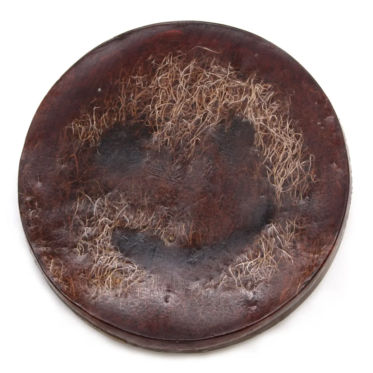 Natural soap bar Happy Scrub Soap in coconut scent with creamy texture and embossed branding on the surface