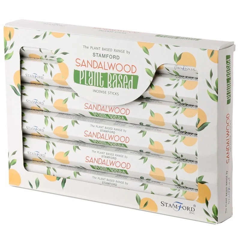 Box of plant based incense sticks with sandalwood scent displayed on a white background