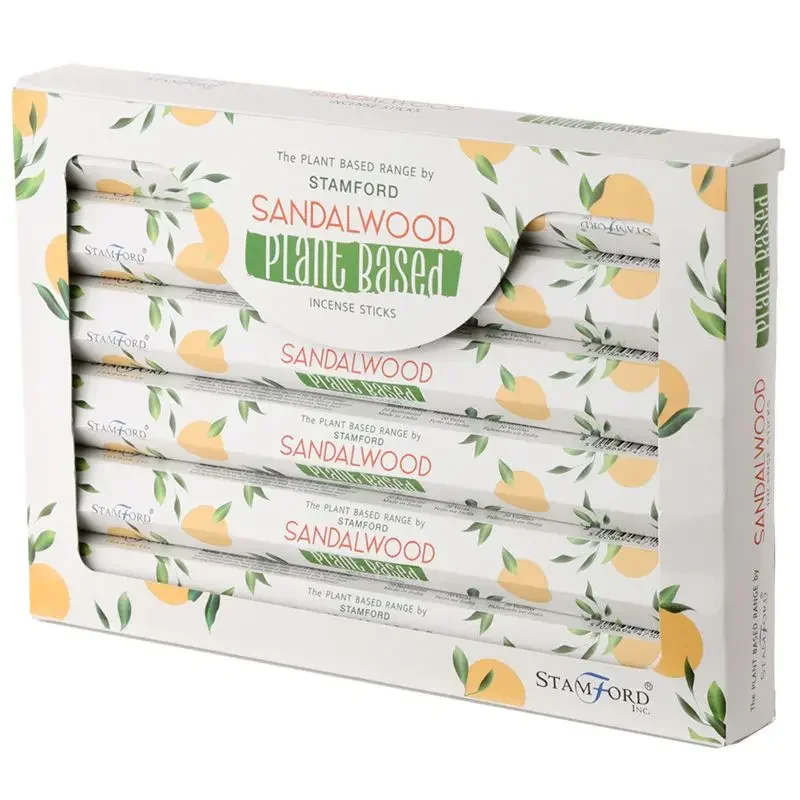 Bundle of plant based sandalwood incense sticks neatly arranged on a white background