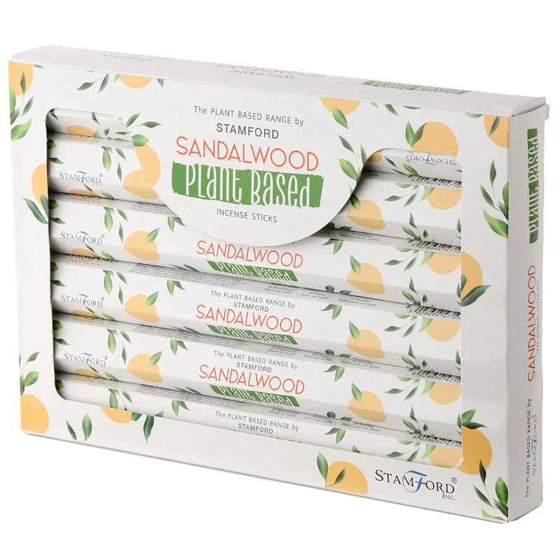 Bundle of plant based natural incense sticks with sandalwood scent on a white background
