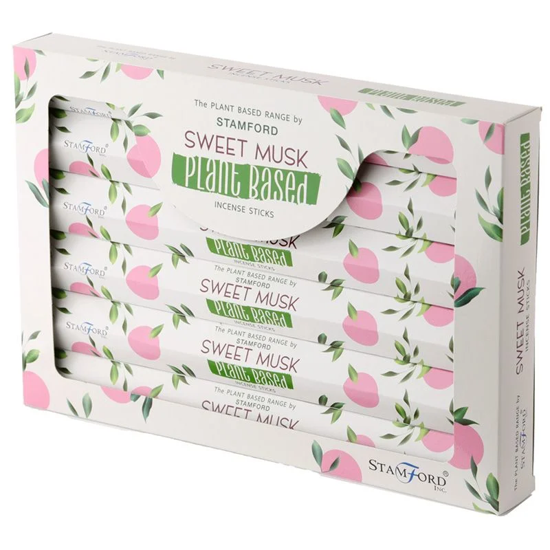 Bundle of natural incense sticks with sweet musk scent, laid out on a neutral background