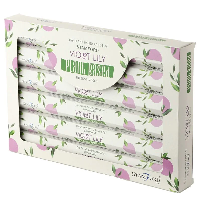 Bundle of violet lily scented natural incense sticks with green tips on a white background