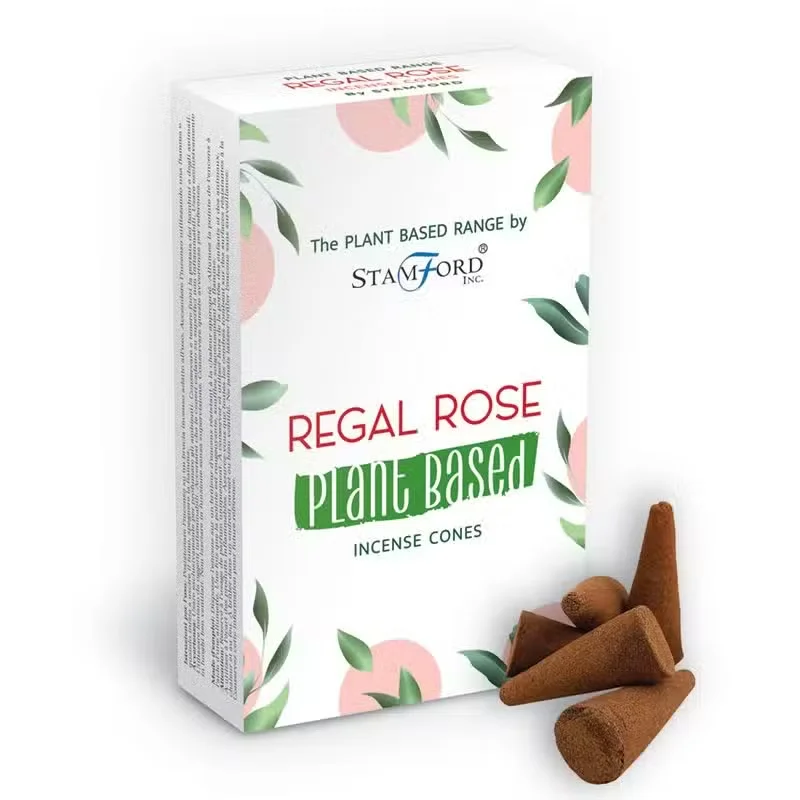 Regal Rose plant based incense cones arranged on a wooden surface with rose petals scattered around