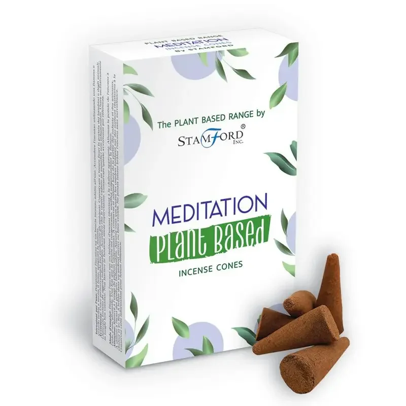 Meditation incense cones made from plant-based materials arranged on a wooden surface with soft lighting