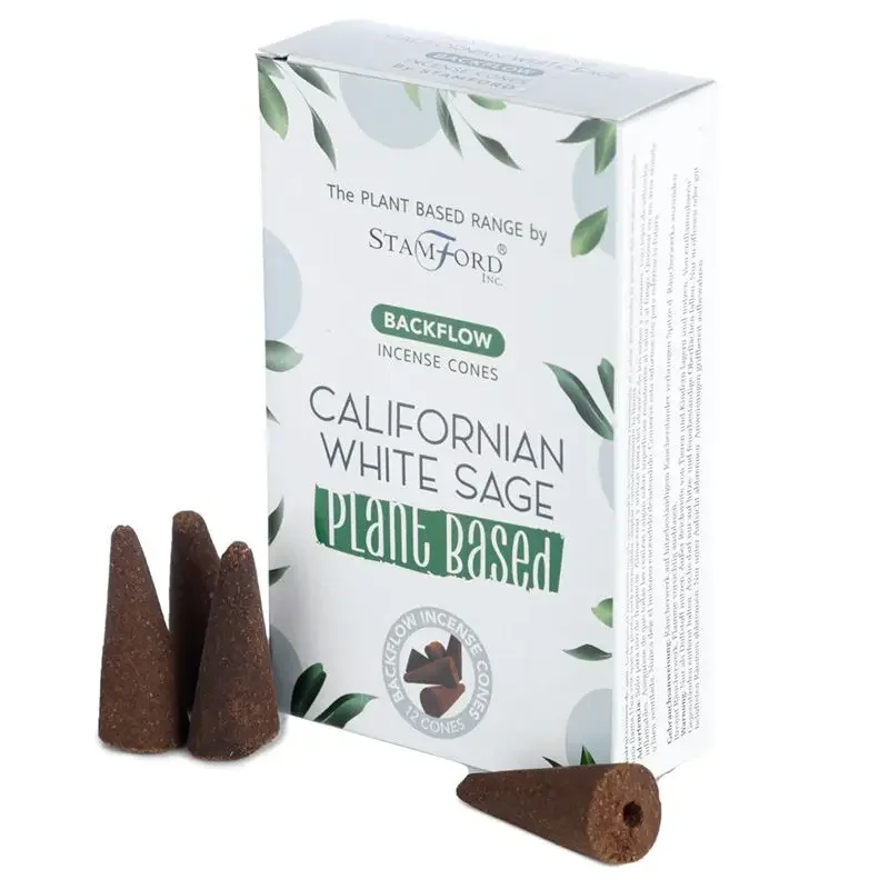 Stack of plant based incense cones with Californian white sage scent on a plain background
