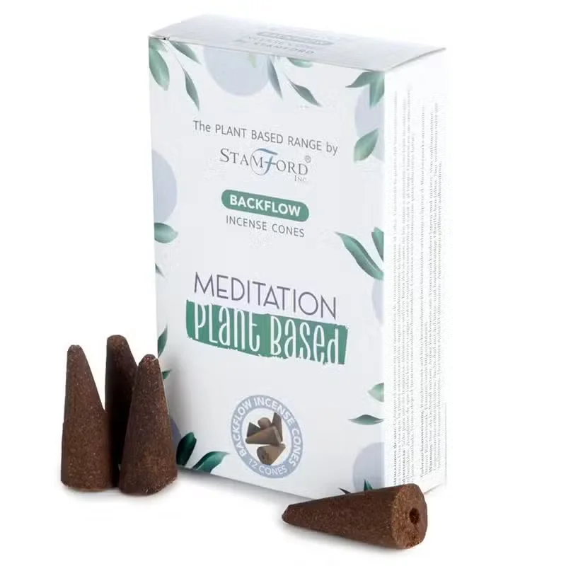 Plant based backflow aromatherapy cones arranged for meditation with smoke flowing downward in a calming setting