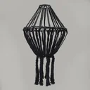 Black macrame drop chandelier, boho ceiling light, hanging with thick rope strands.