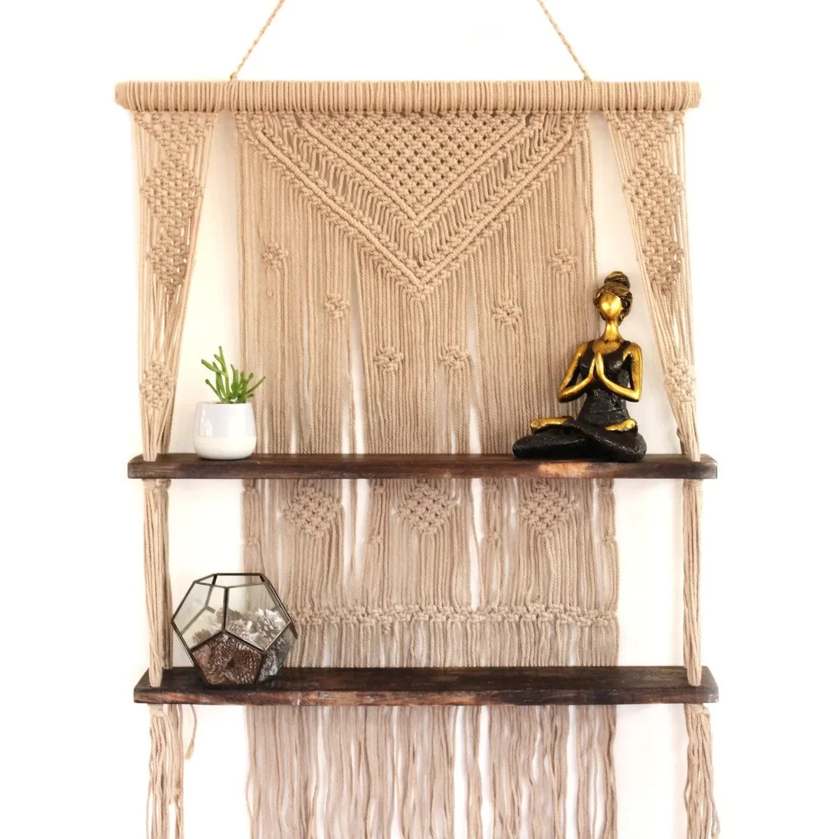 Brown macrame hanging shelves with intricate knot patterns, suspended against a plain background
