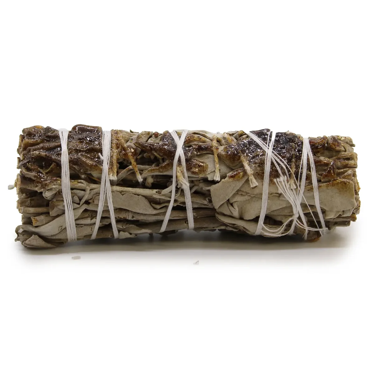 Smudge stick 10cm made of copal resin, tightly bound with natural fibers against a white background