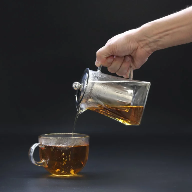 Tower‑shaped glass tea maker 350ml clear glass infuser teapot.