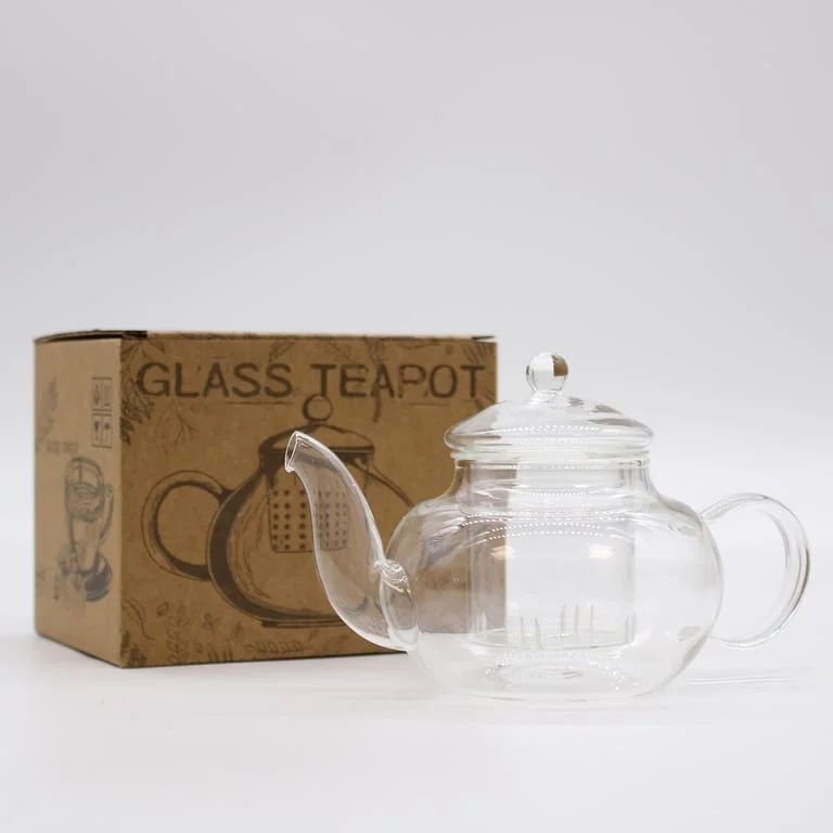 White glass round pearl teapot with infuser, 400ml capacity, displayed in a minimalist setting.
