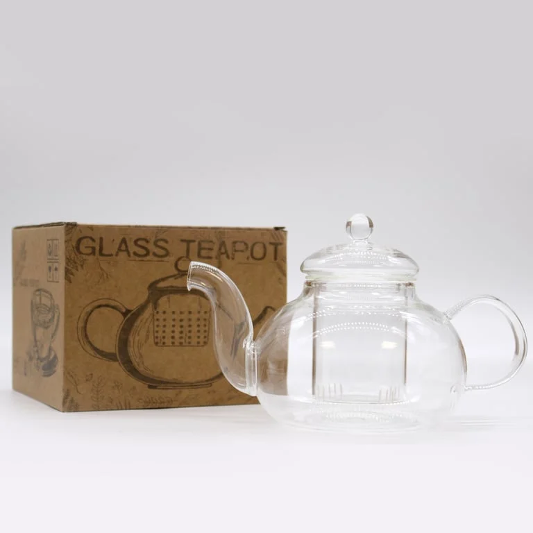 Clear glass round pearl infuser teapot with metallic lid, 800ml capacity, displayed on a wooden surface.