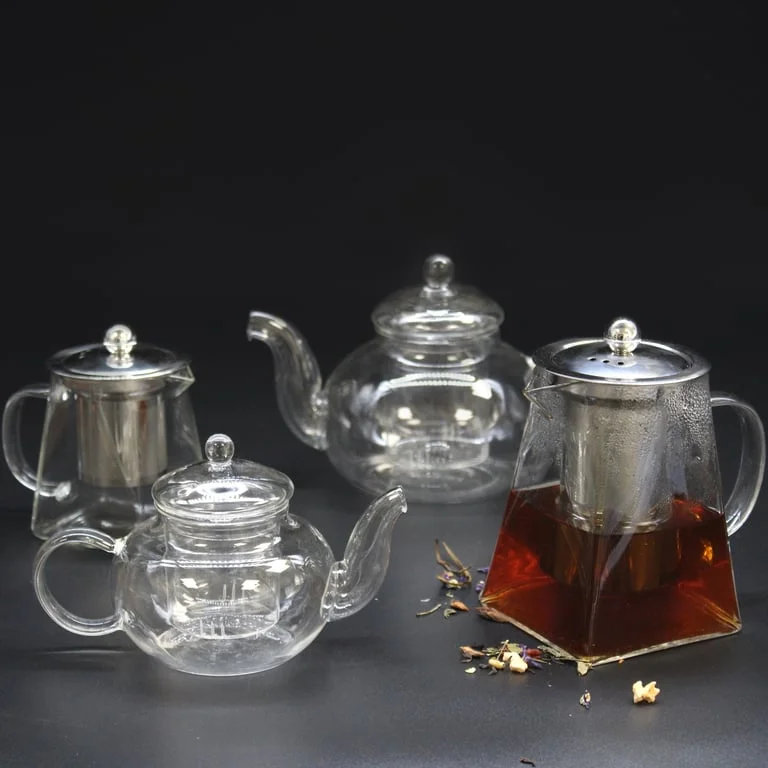 Glass tea infuser kettle with round pearl design, 800ml capacity.