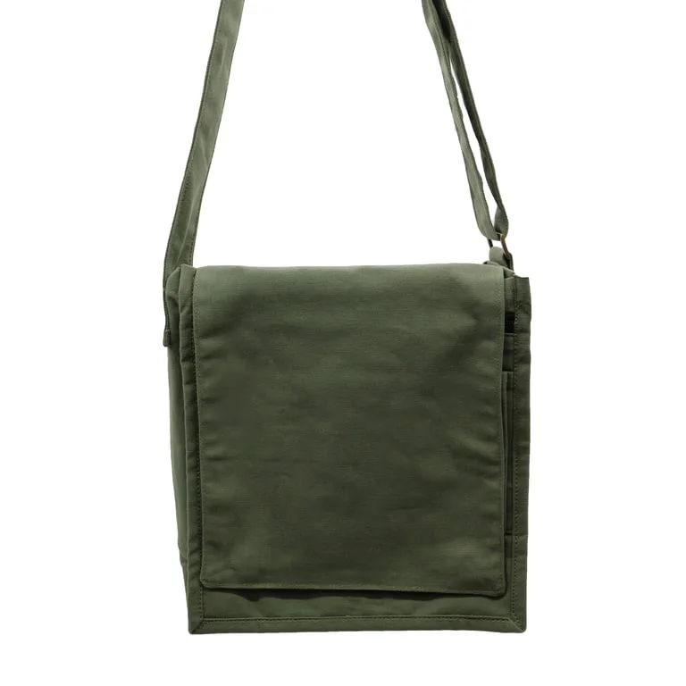 Green cotton canvas messenger bag with sturdy handle and minimalistic design.