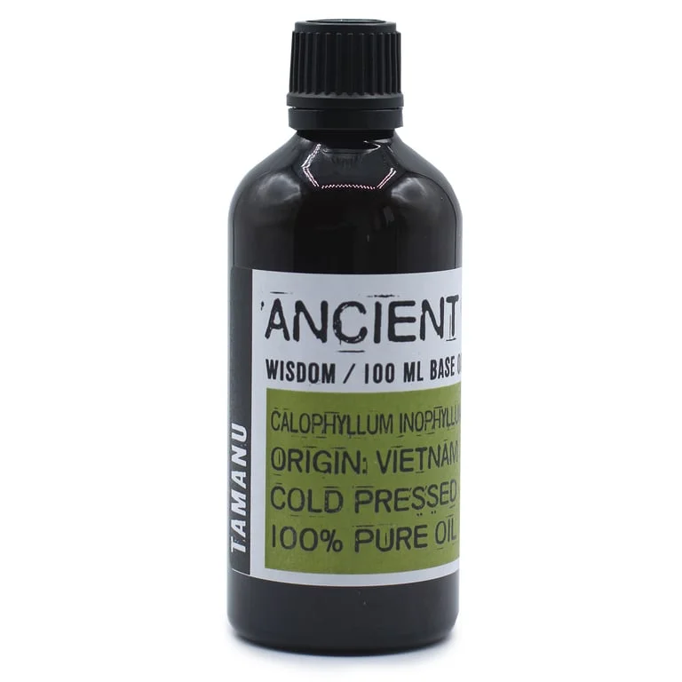 Tamanu oil 50ml bottle holding brown liquid.