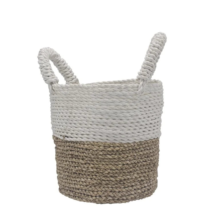 Natural white seagrass storage baskets in set, arranged together.