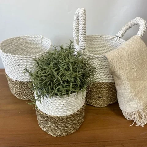 seagrass basket set in grey, natural and white tones.