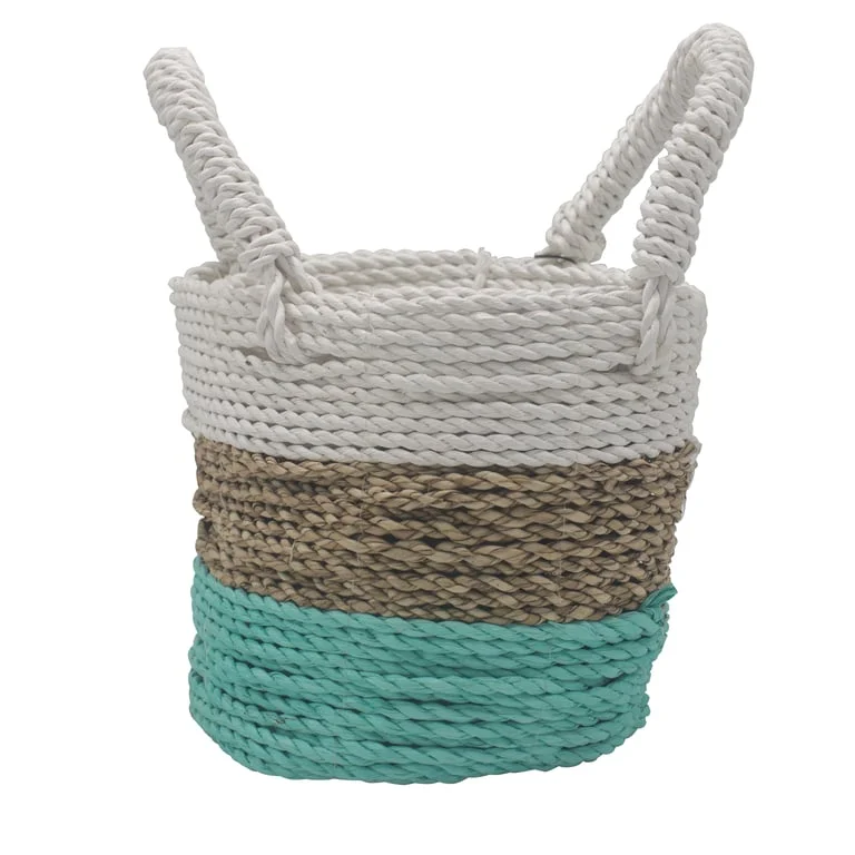 handcrafted seagrass basket set in green, natural and white woven baskets displayed together