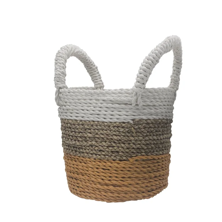 Seagrass basket set with orange, natural and white baskets.