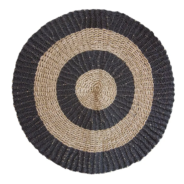 Round seagrass basket in black and tan featuring a circular pattern, 1m size.