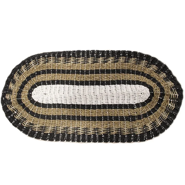 Oval seagrass basket in black, white and tan, 60x120cm, classic design.