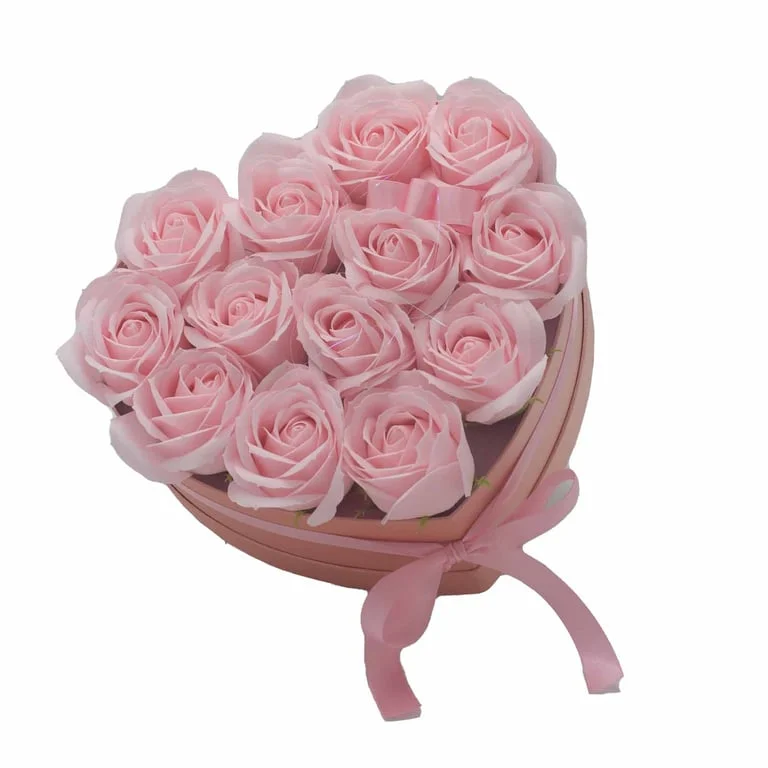 Soap flower bouquet with 13 pink roses arranged to form a heart shape.
