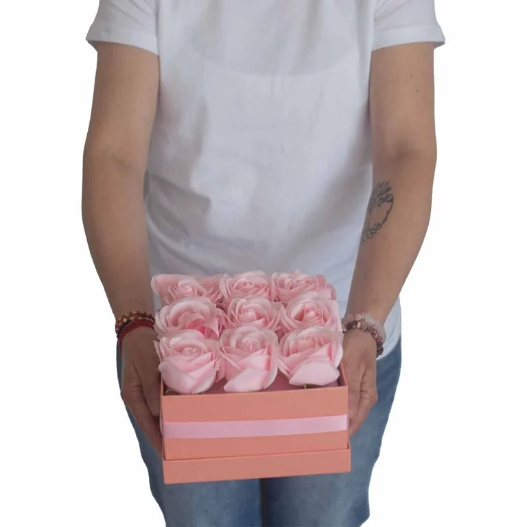 Soap flower bouquet of 13 pink roses arranged in a heart shape
