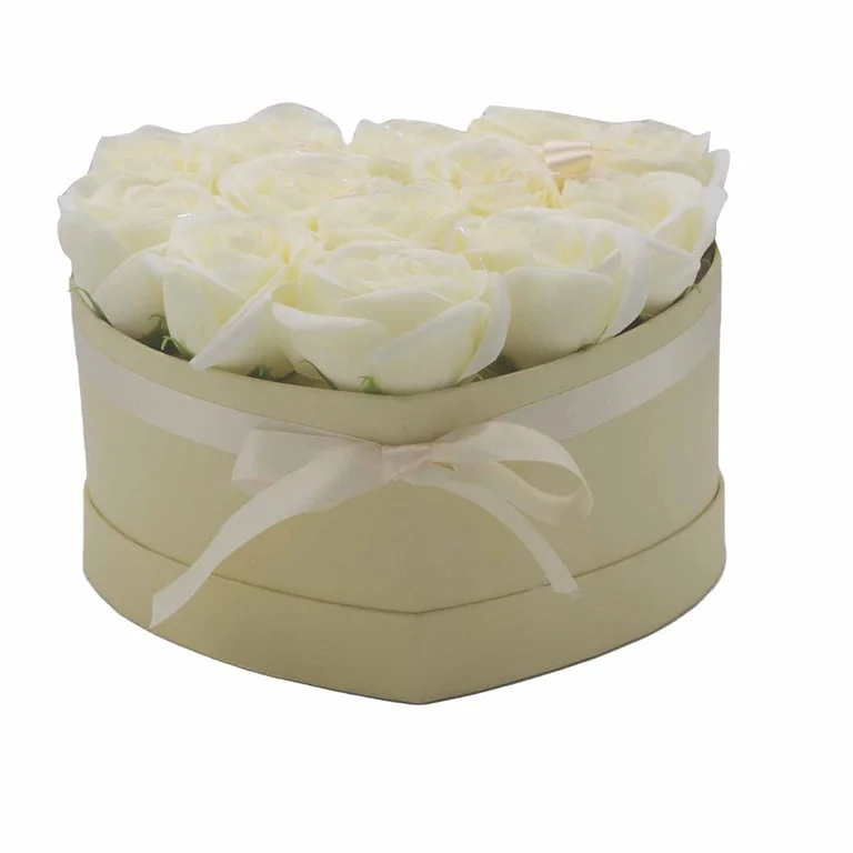 Cream rose bouquet arranged in a heart shape with 13 soap roses.