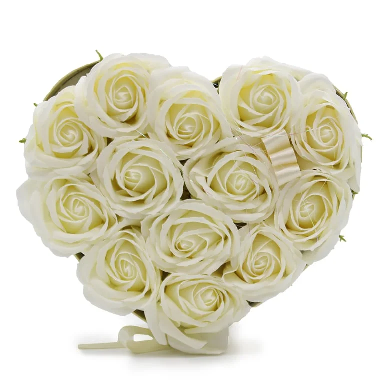 Soap flower bouquet of 13 cream roses arranged in a heart shape.