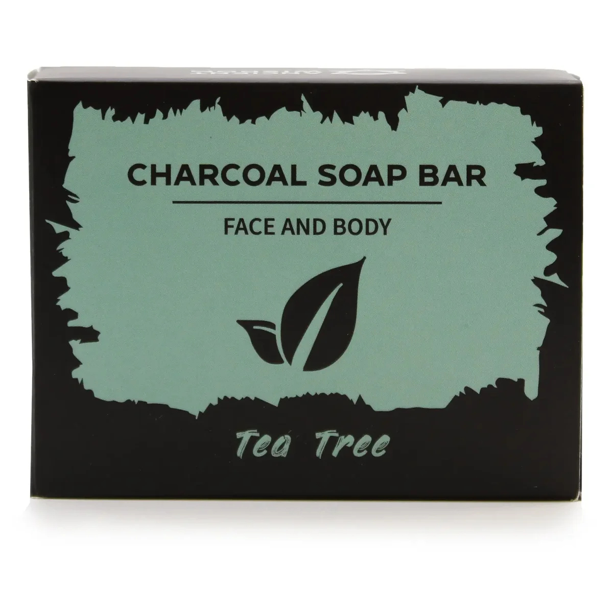 Dark charcoal soap bar in a sleek green box with a tea tree leaf illustration, labeled 85g.