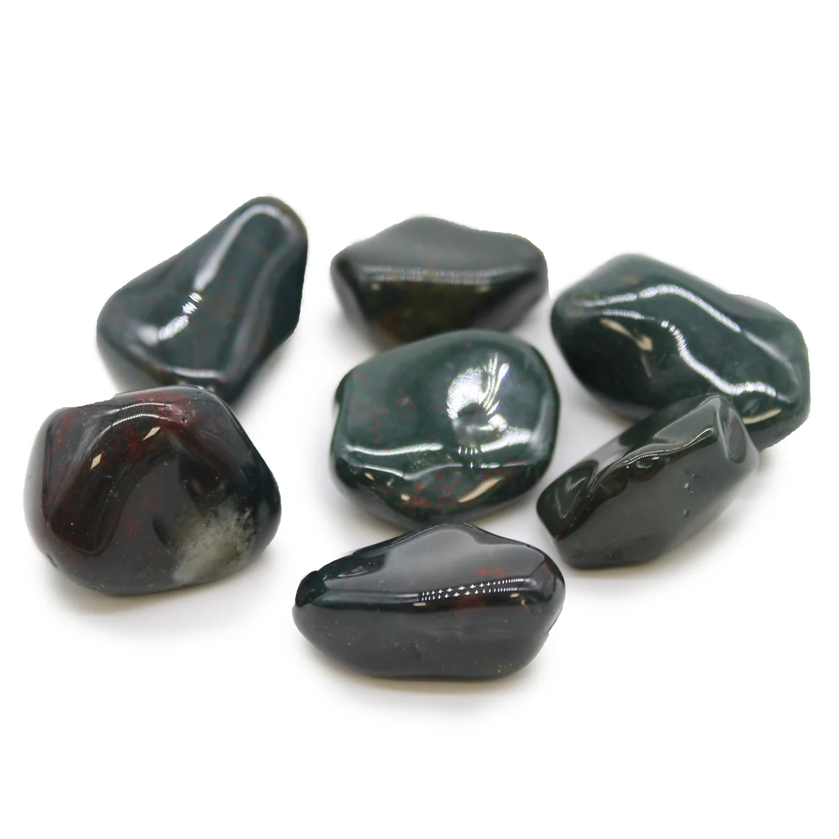 XL bloodstone tumble stones arranged on a dark surface, showcasing natural matte finish, perfect decorative tumble stones.