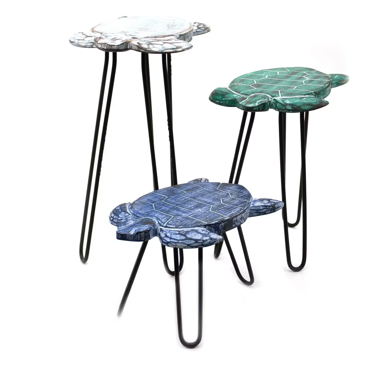Three turtle plant stands made of Albasia wood in varying heights arranged together on a white background