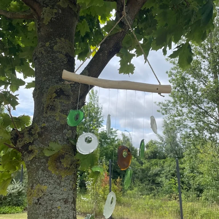 Unique garden ornaments: assorted bottle bottom chimes