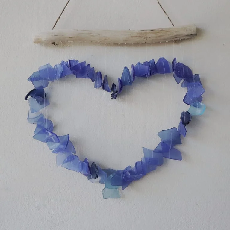 Blue love chime hanging on a string.
