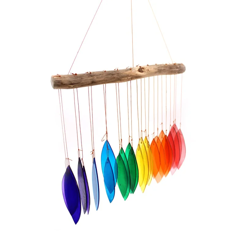 Rainbow glass chime hanging from a wooden stand, colourful glass tubes inside.